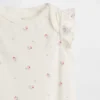 Baby First Favorites, κορμάκι από οργανικό βαμβάκι με φτερωτά μανίκια
