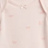 Baby First Favorites Οργανικό βαμβακερό κορμάκι με φιόγκο