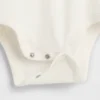 GAP × Disney Baby Κορμάκι από βιολογικό βαμβάκι