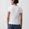 Μοντέρνο T-shirt με ραβδώσεις και κουμπιά μπροστά