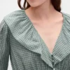 Μπλούζα με V-neck και γιακά με βολάν