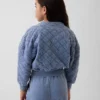 Παιδικό μπουφάν με φερμουάρ, καπιτονέ και oversized γραμμή