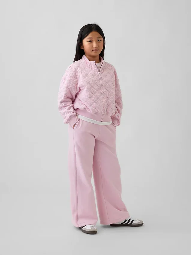 Παιδικό μπουφάν με φερμουάρ, καπιτονέ και oversized γραμμή