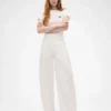 Παντελόνι GAP × Victoria Beckham με ψηλή μέση και πτυχωτό τόξο
