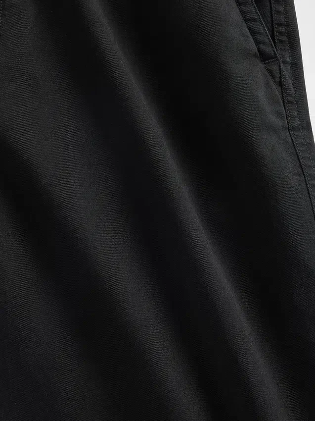 Βαρύ καμβά τύπου twill, χακί σε χαλαρή γραμμή εμπνευσμένη από τη δεκαετία του '90